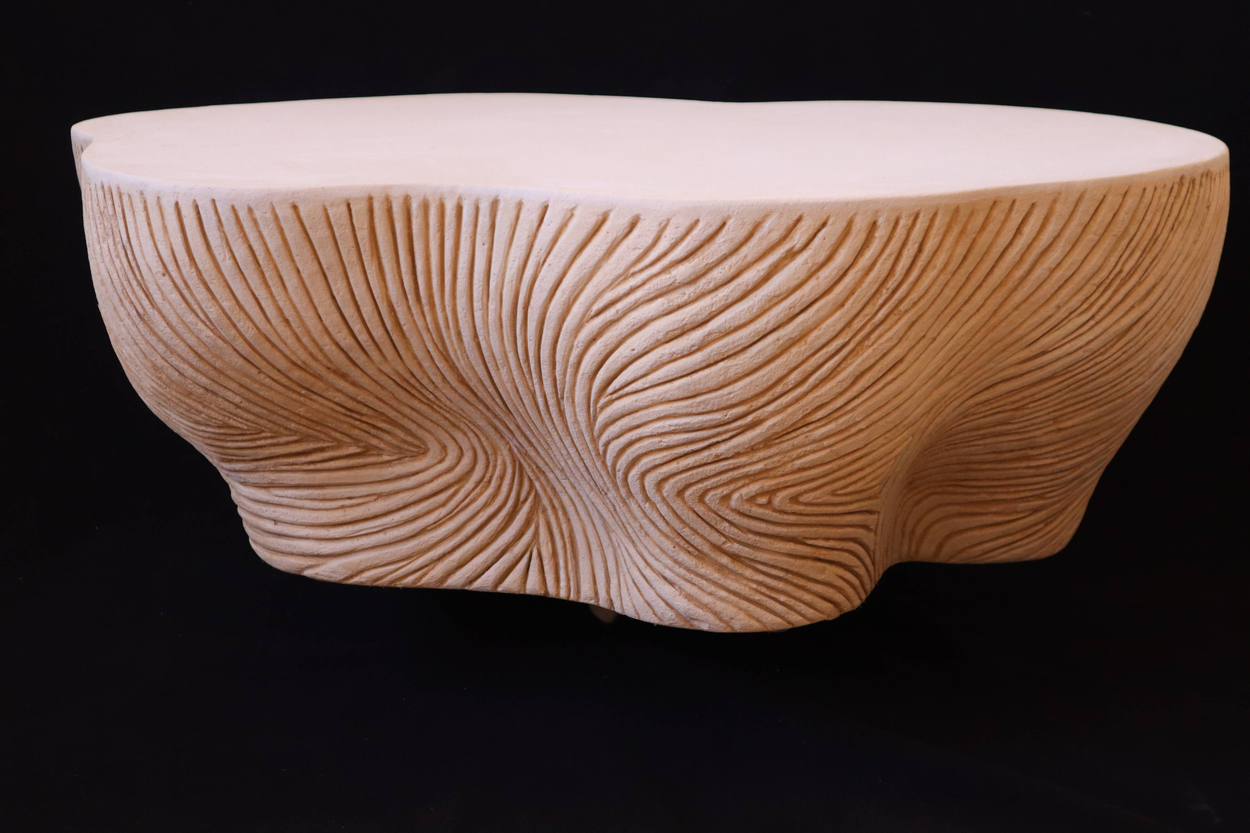 Design coffee table with travertine rock effect — unique piece hand-sculpted.