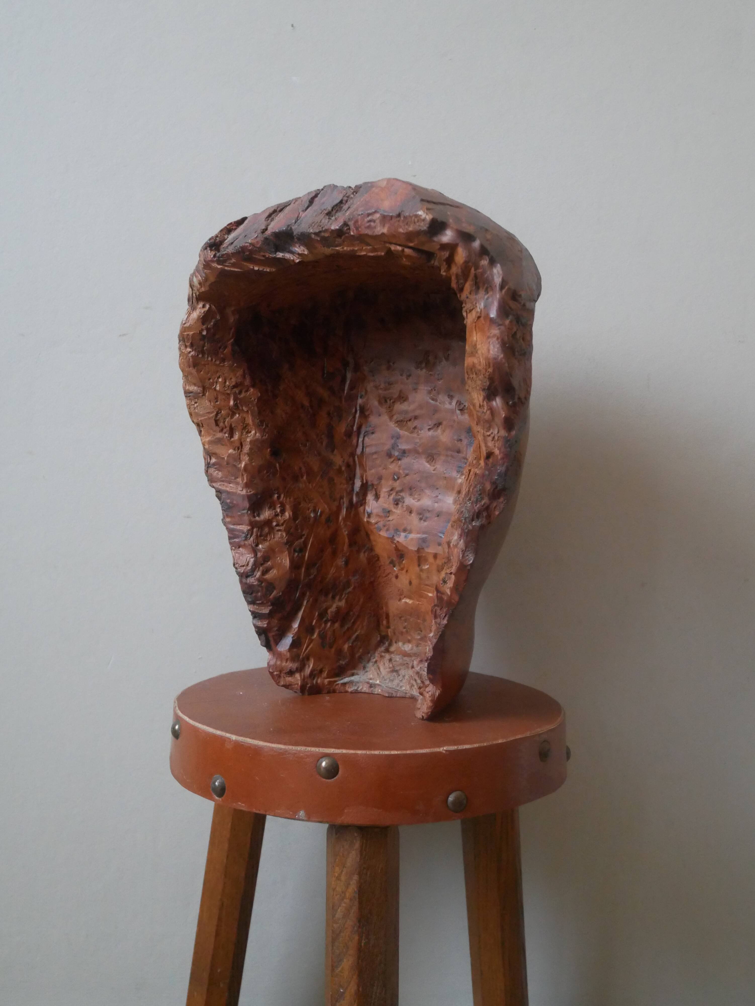 Wooden sculpture ethnic man's head handcrafted tribal decorative object workshop