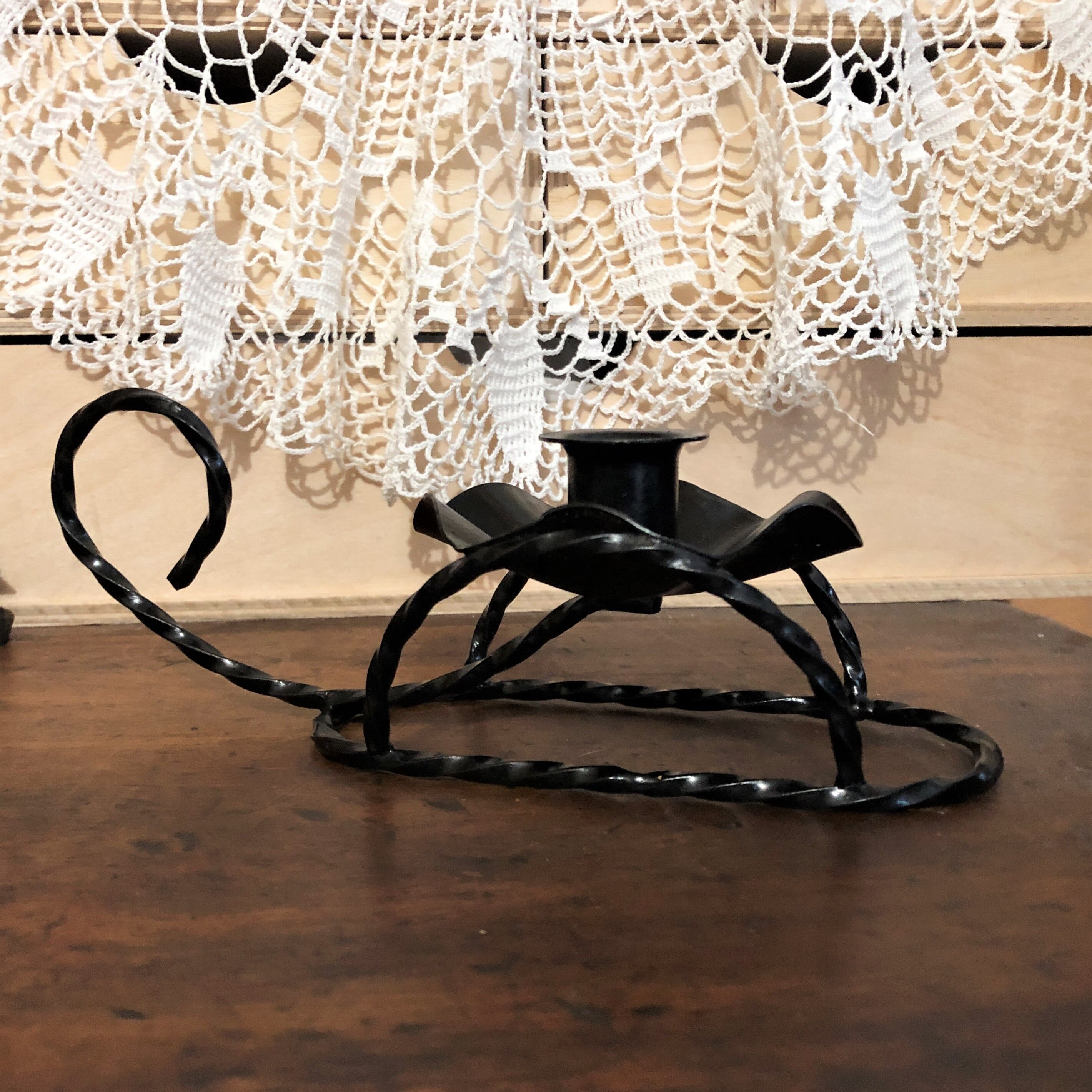 Handmade hand candle holder in vintage black wrought iron