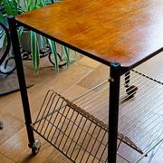 vintage 60s vinyl rolling table with wooden top