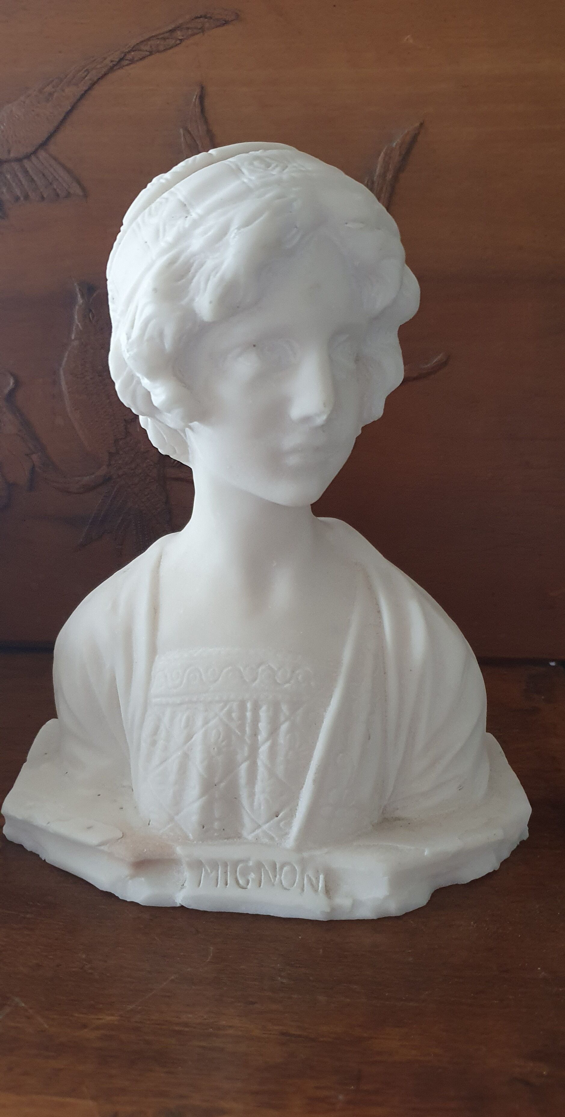 Bust of young woman L.Mignon