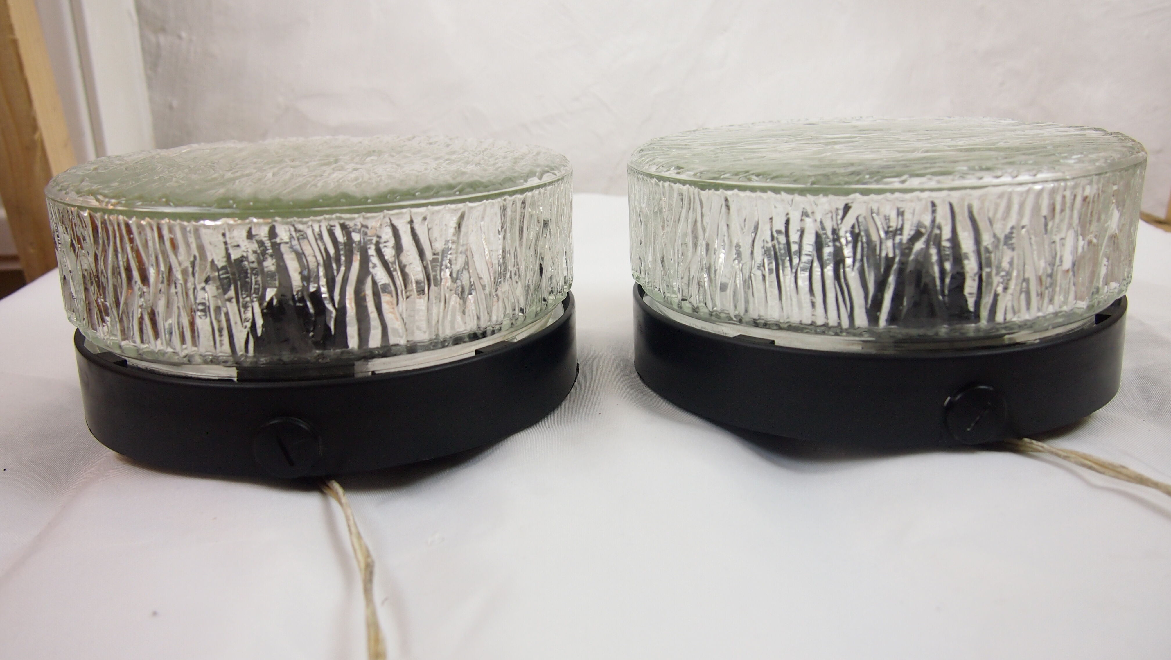 Pair of mapelec textured glass wall lights, 1970