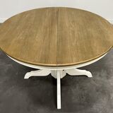 Round extendable oak dining table