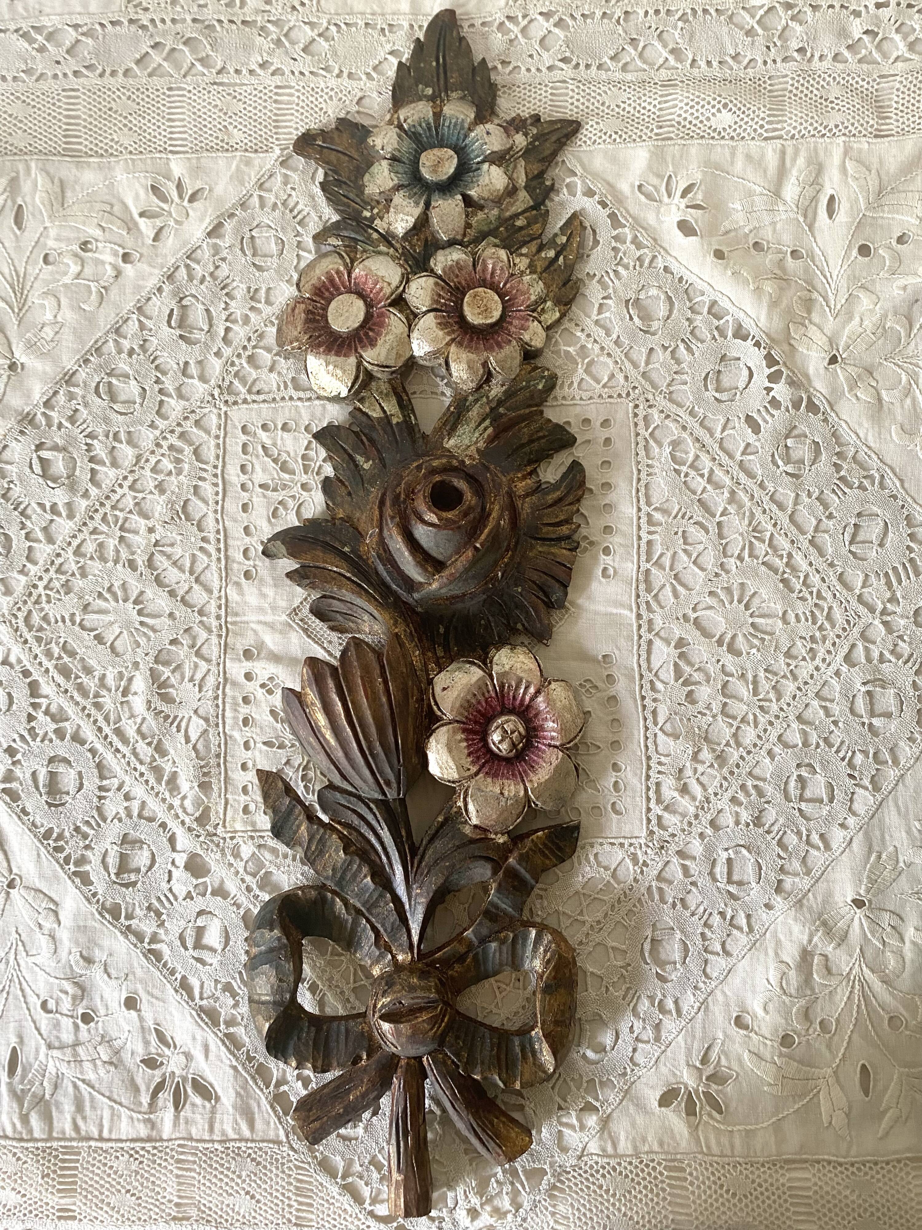 Decorative carved wooden ornament bouquet flowers and ribbon