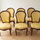 Set of 6 antique classic style chairs in wood and yellow fabric.