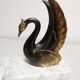 Pair of ancient zoomorphic bookends, swan statues
