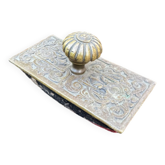 Old office blotting pad in chiseled bronze