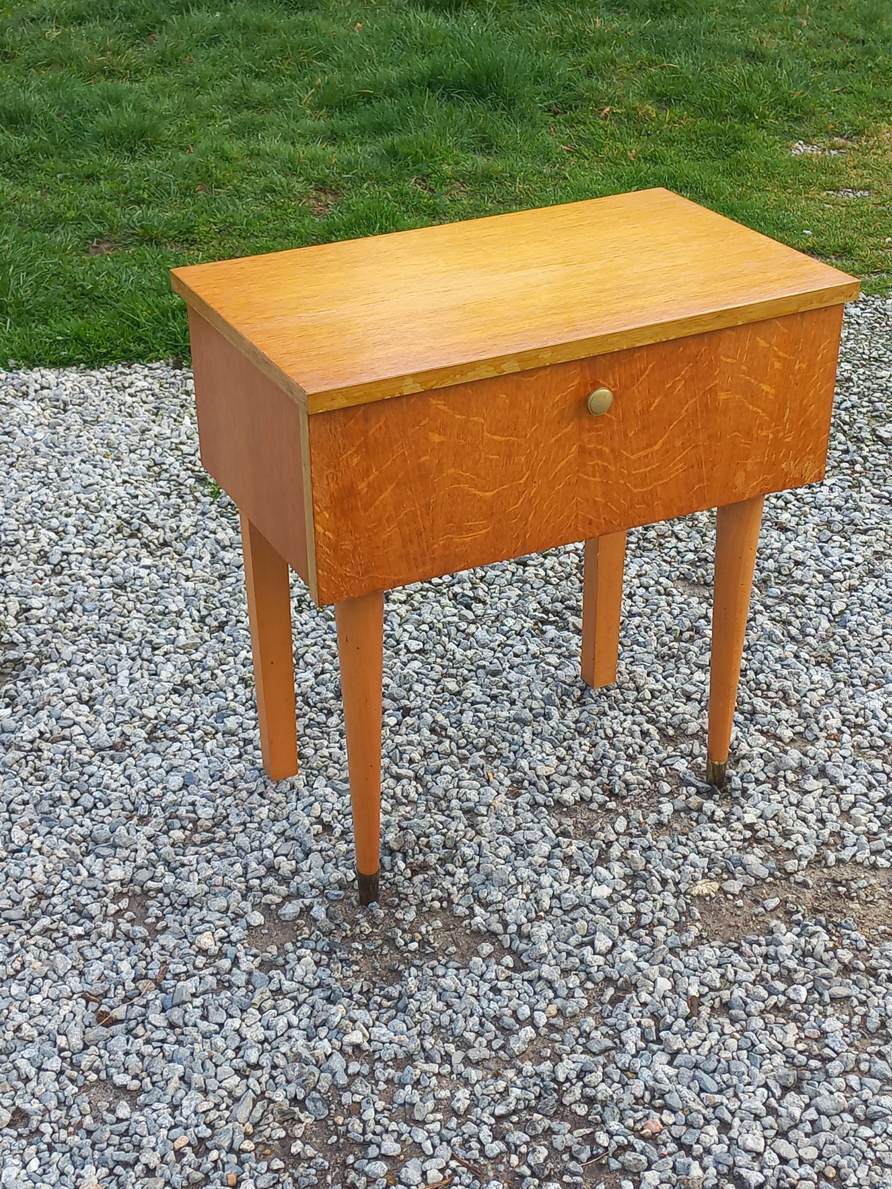 Vintage 1950s bedside table in blond oak with conical legs