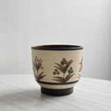 Cache pot en céramique.
