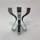 A chromed metal candle-holder "Chorus", design Karim Rashid, executed by Umbra / USA 2002