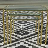 Nesting tables in gold-tone metal and glass