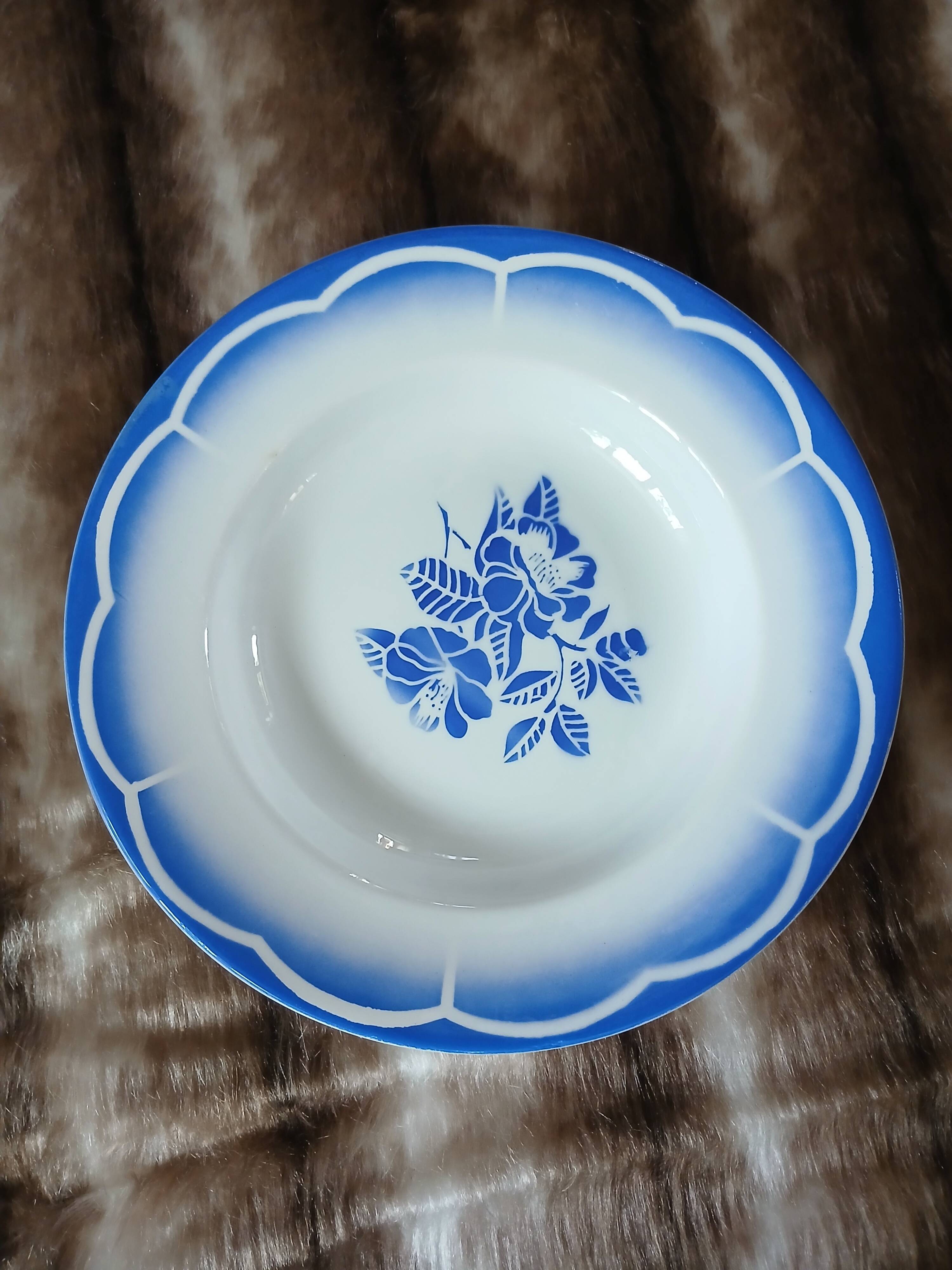 8 mismatched antique deep plates