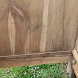 Lit ancien en bois brut