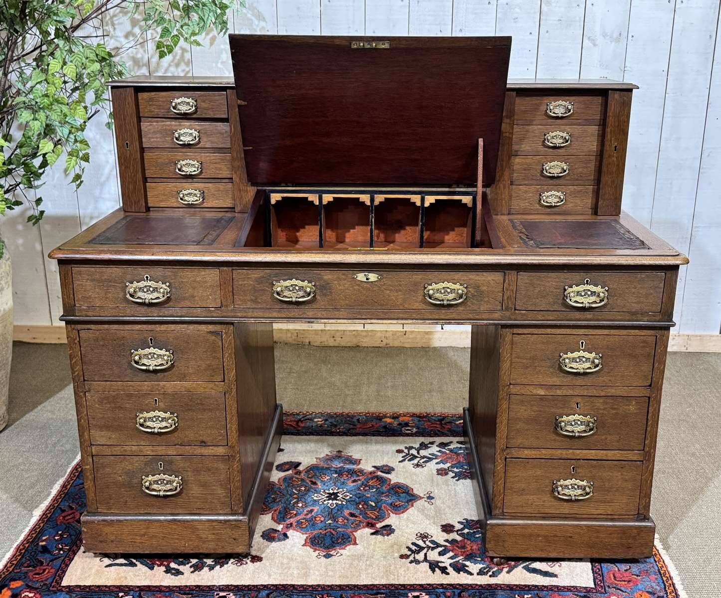 English oak graduated desk from the late 19th century.