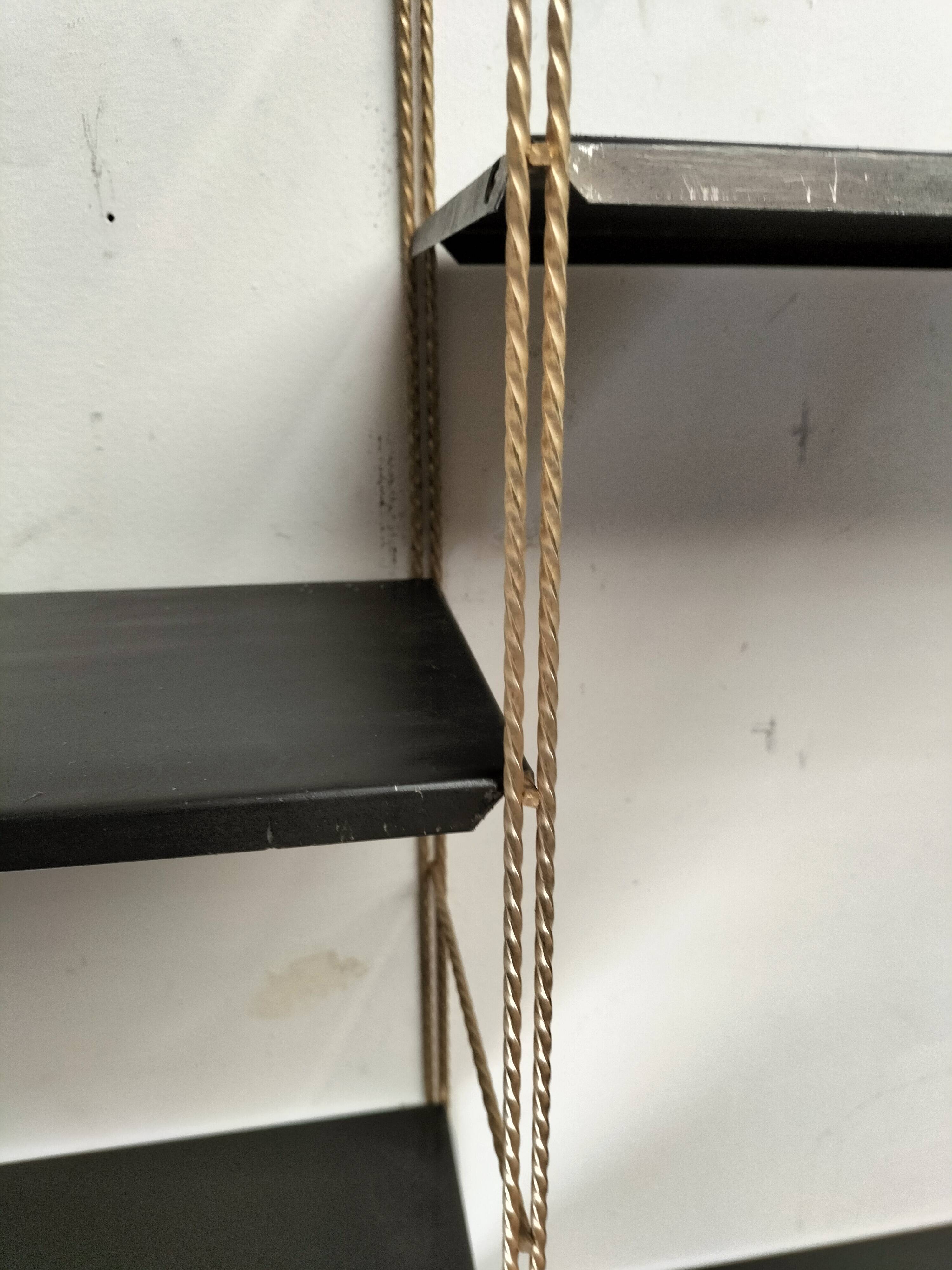 Modular black metal shelf