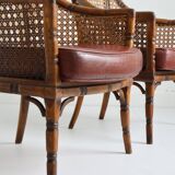 Pair of armchairs in walnut and antique cane, 19th century
