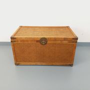 Vintage trunk in wood, rattan, caning, and brass.