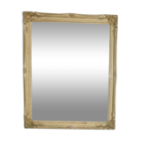 Beveled mirror in carved wood