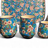 Longwy, cherry blossom glazed earthenware smoking set, early 20th century