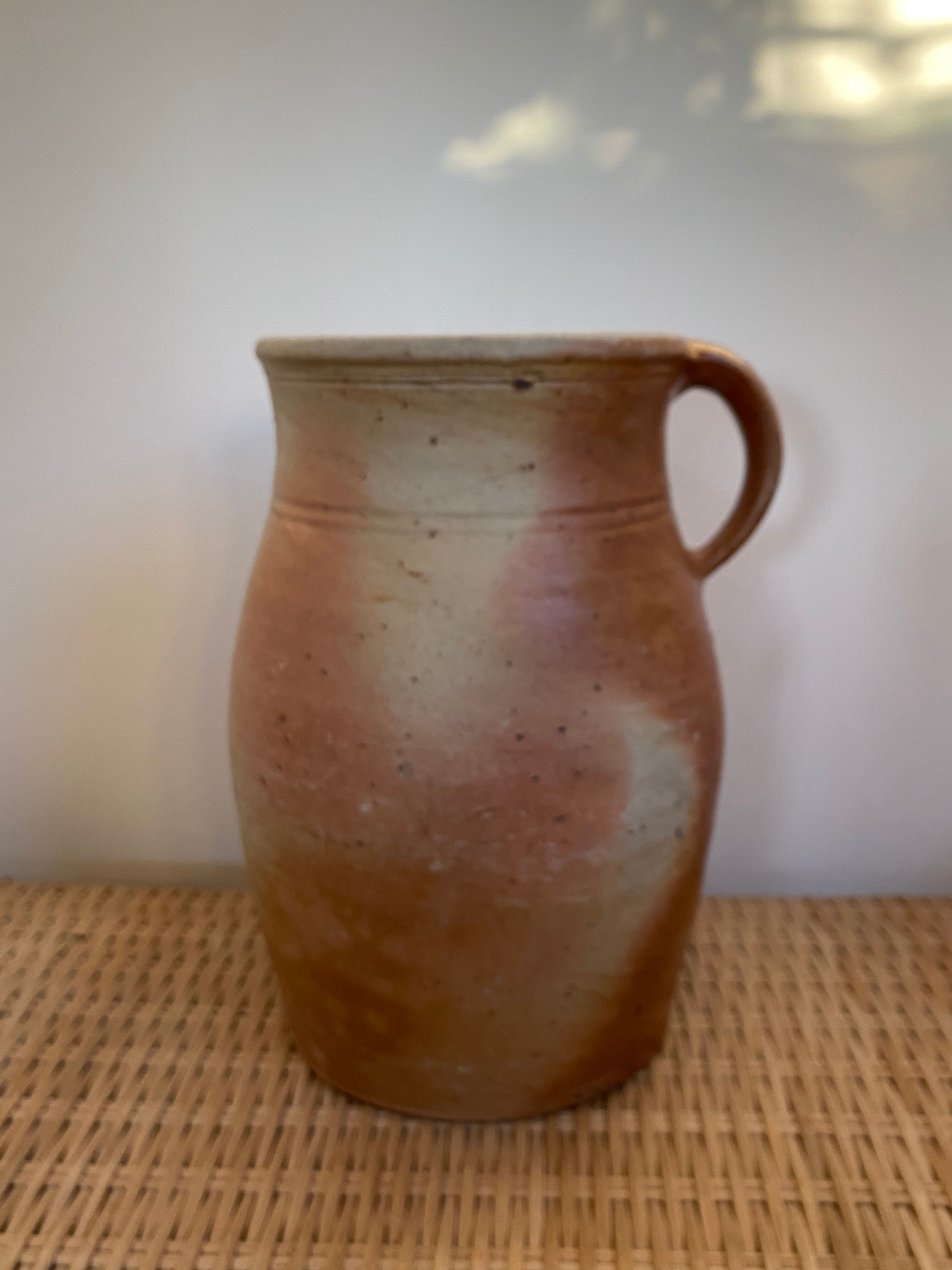 Old sandstone pitcher pot