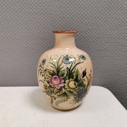Italian vase from the 70s, in a delicate pink color with floral decoration.