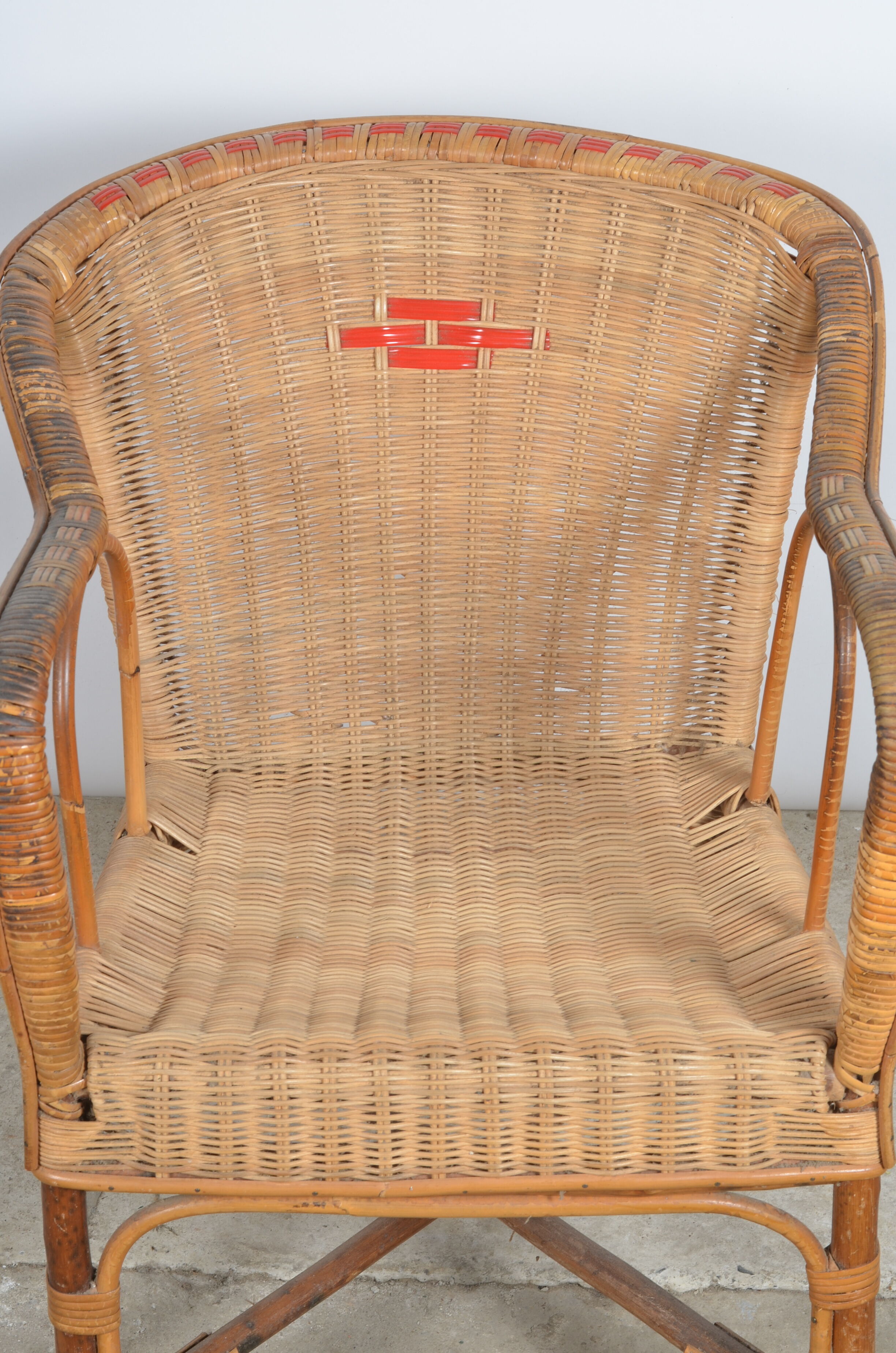 Rattan armchair and scoubidou décor