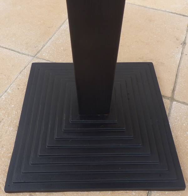 Vintage professional bistro table and its cast iron base