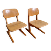 Pair of children's chairs by Casala in solid beech, 1960s.