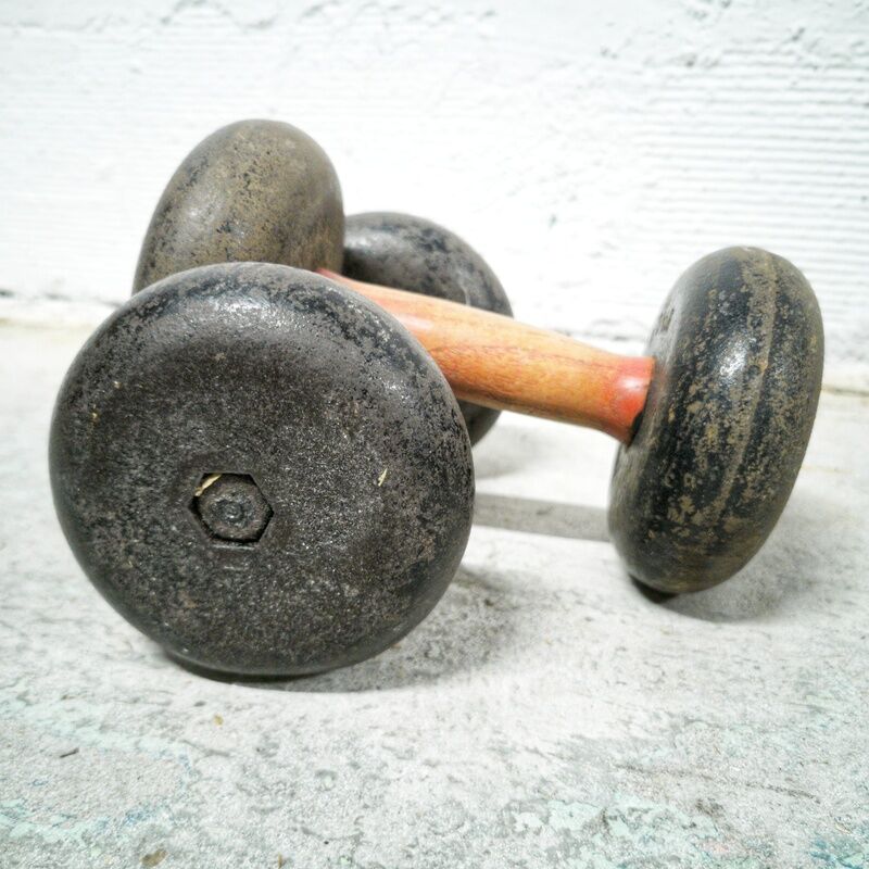 Pair of dumbbells wood and cast iron
