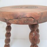 Two vintage tripod solid wood stools