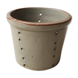 Pot with pheasant in earth