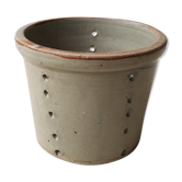 Pot with pheasant in earth