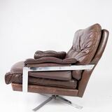 Chaise facile rembourrée avec cuir brun patiné et cadre en métal, conçu par Arne Norell