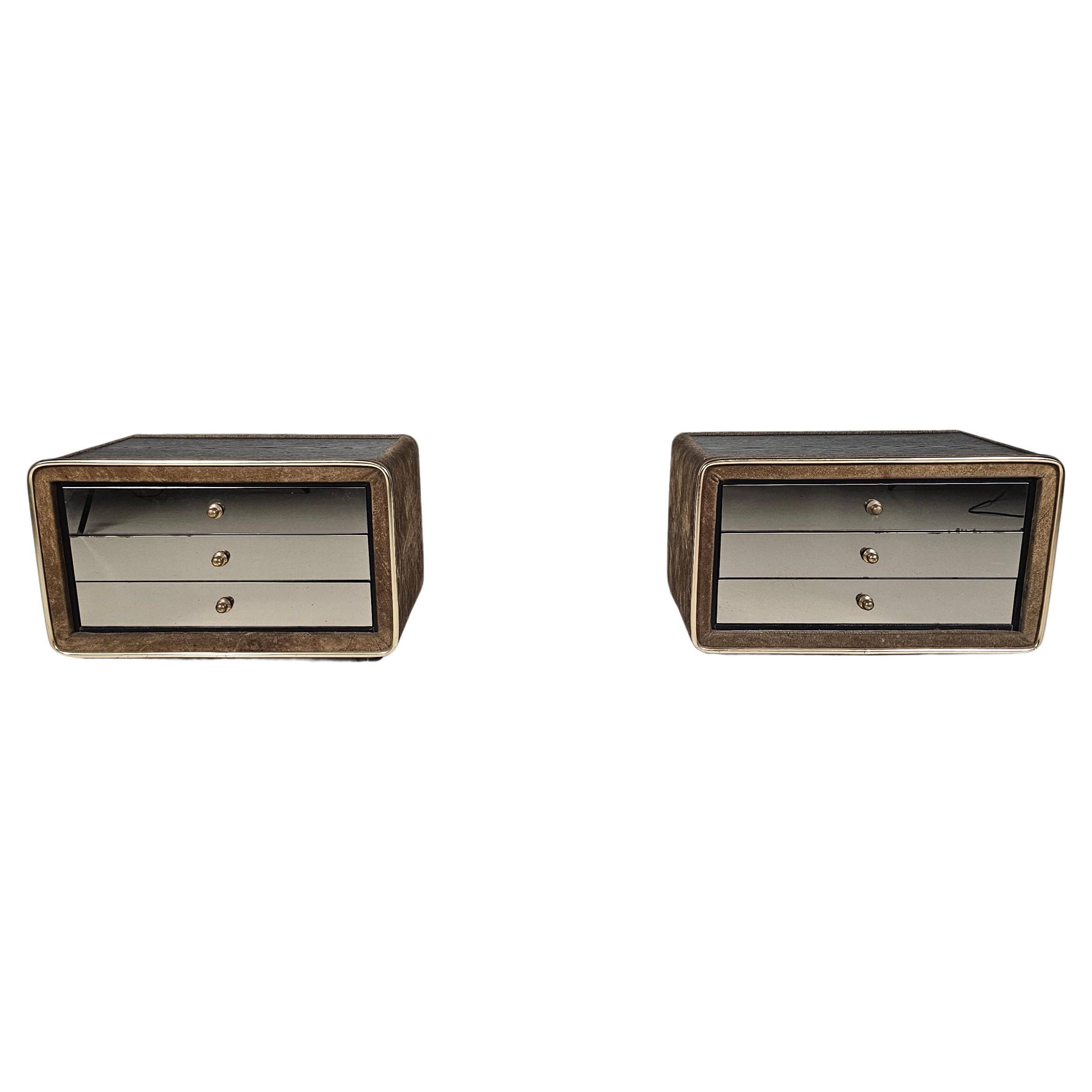 Pair of brass and suede bedside tables by RUF International, 1970.