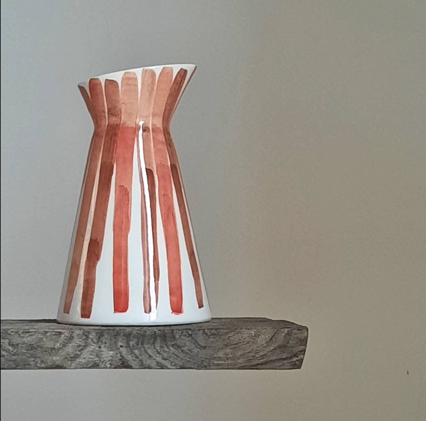 Coral-burgundy pitcher