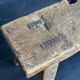 Ancient Chinese farm bench in patinated wood, small rustic stool.