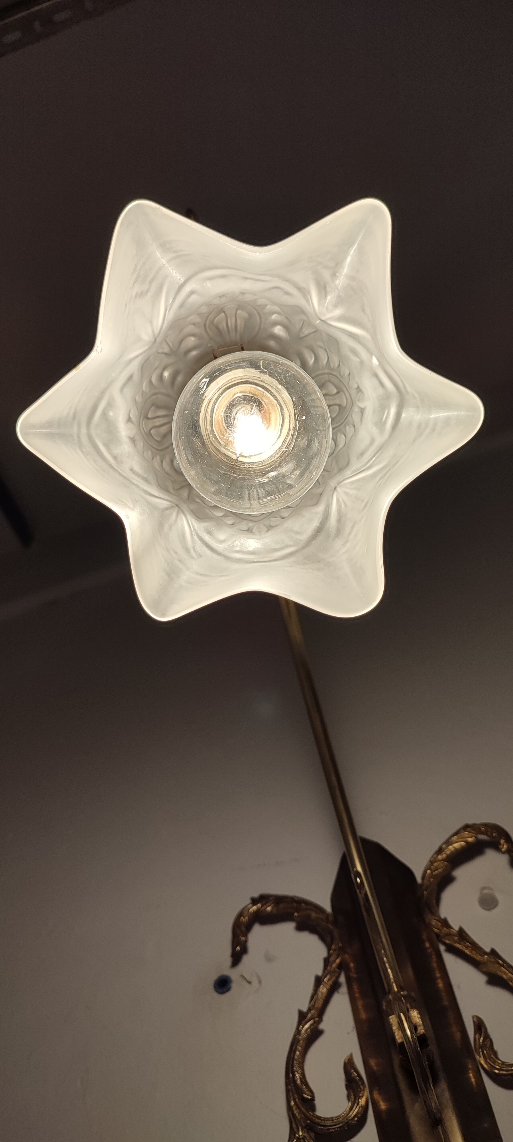 Bronze Modernist wall lamp. Spain, 1930s.