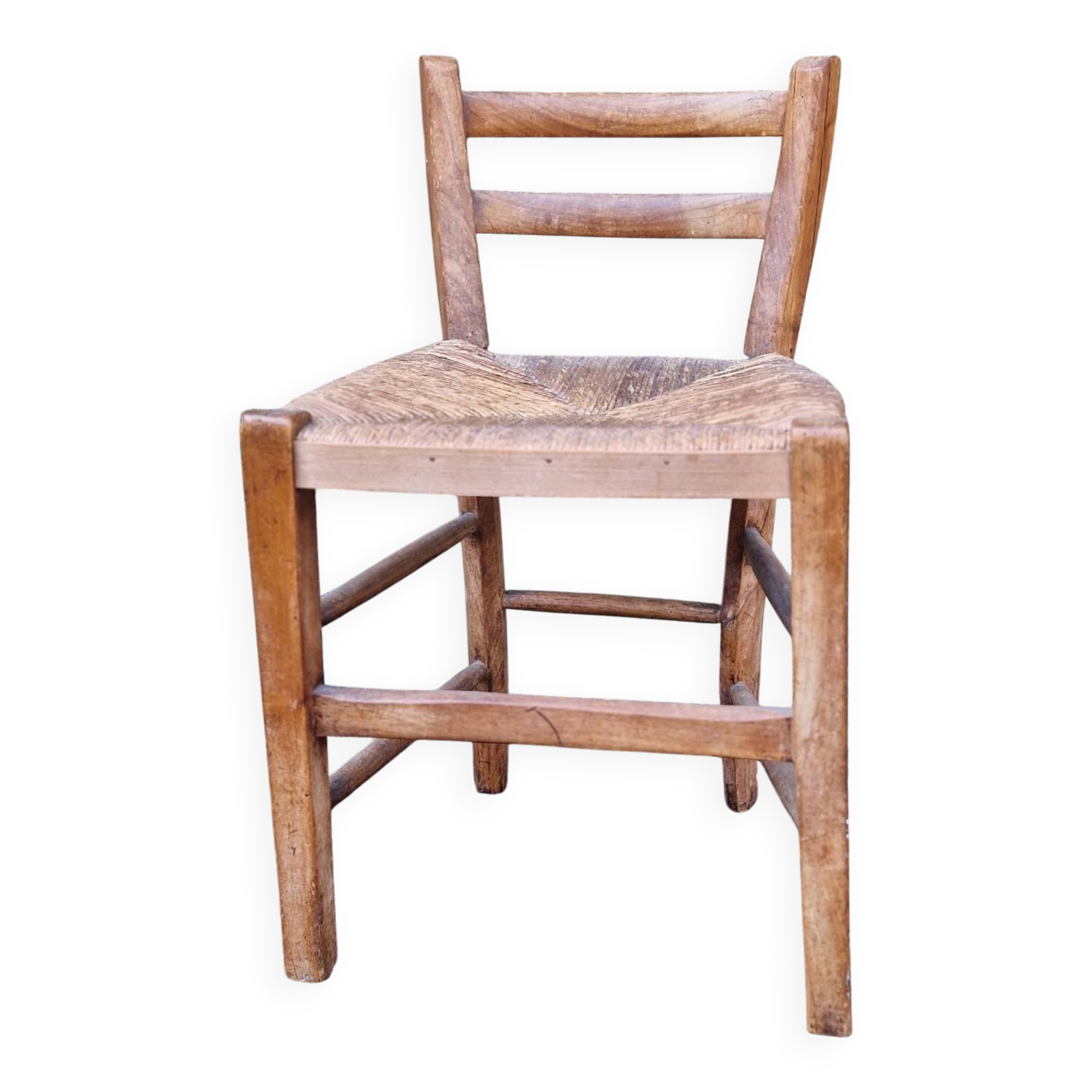 Antique straw chair with low back