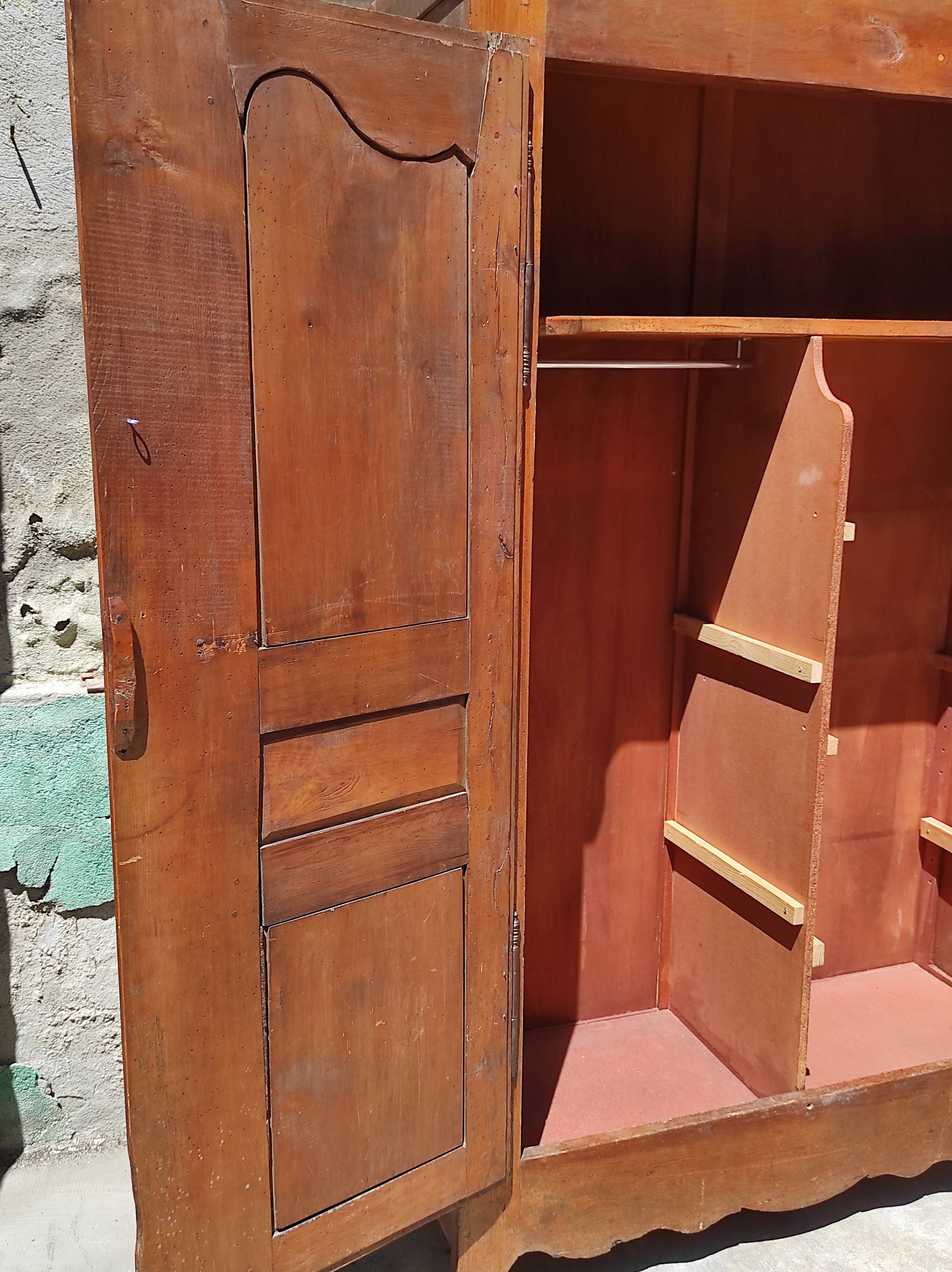 Old rustic oak cabinet of the 19th century louis 15 style