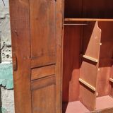 Old rustic oak cabinet of the 19th century louis 15 style