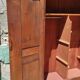 Old rustic oak cabinet of the 19th century louis 15 style