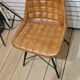 4 camel-coloured leather seating chairs