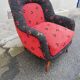 Fauteuil année 50 rouge et noir pieds compas