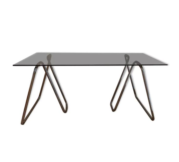 Smoked glass desk on tubular chrome trestles, 1970s design.