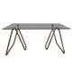 Smoked glass desk on tubular chrome trestles, 1970s design.