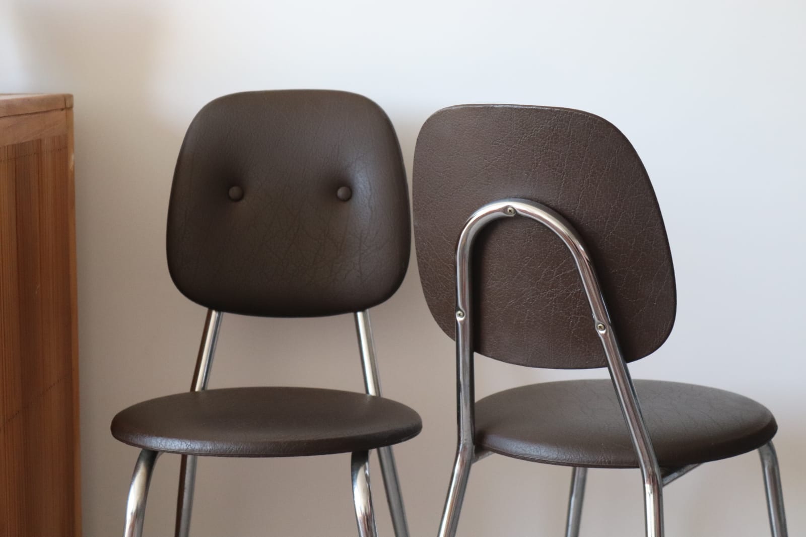 2 chairs 70s in chocolate skaï and chrome metal