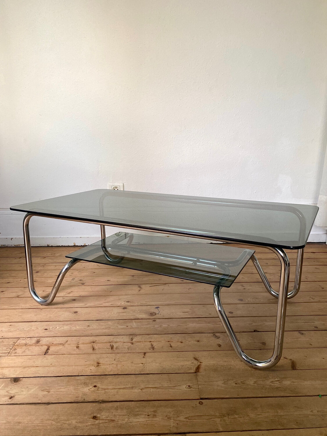 Tubular frame smoked glass coffee table 1970 vintage