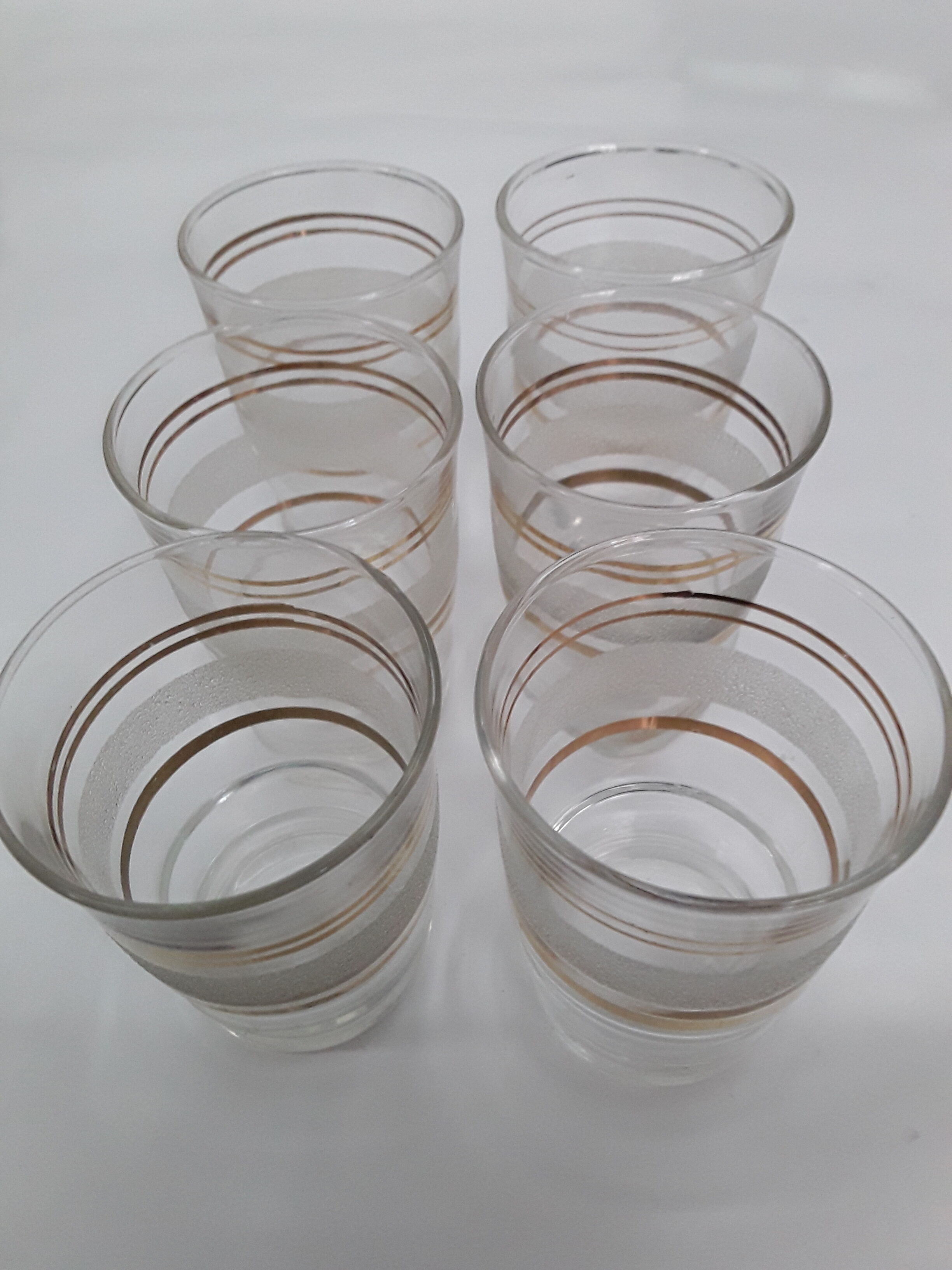 6 vintage glasses lined golden