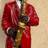 Large black and red jazz figurine in fibreglass, decorative sculpture from the 1960s.