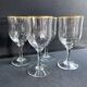 4 Daum water glasses with gold putoises